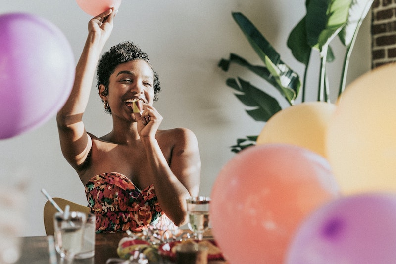 A joyful woman celebrates her birthday with her friends, surrounded by balloons, cake, and party favors. Feeling sad or alone on your birthday?  It's normal to feel sad sometimes, but you don't have to feel sad on your birthday.