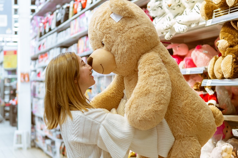 adults talking to stuffed animals